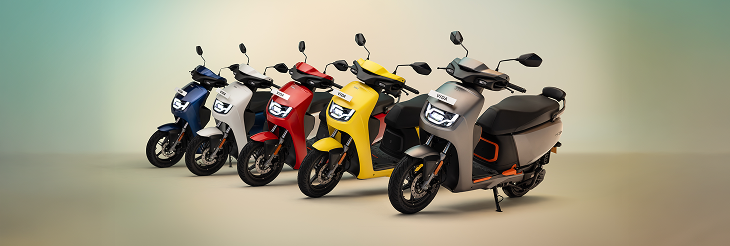  Rider riding VIDA electric scooter after charging it.