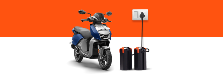  Rider riding VIDA electric scooter after charging it.
