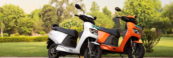  Rider riding VIDA electric scooter after charging it.